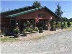 View larger image of The main rustic building at ARCHWAY RV PARK image #1