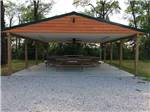The pavilion with picnic benches at ARCHWAY RV PARK - thumbnail