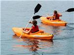 View larger image of People paddling on the lake at SWAN BAY RESORT image #7