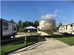 View larger image of A paved pull thru RV site at GRAND TEXAS RV RESORT image #2
