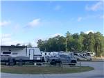 View larger image of A row of paved RV sites at GRAND TEXAS RV RESORT image #5