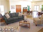 A seating area with couches and chairs at ROUTE 66 RV RESORT - thumbnail