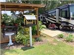 Pergola with picnic table at All About Relaxing RV Park - thumbnail