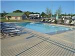View larger image of The fenced in swimming pool at TYLER OAKS RV RESORT image #3