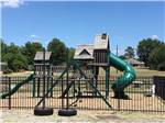 View larger image of The playground equipment at TYLER OAKS RV RESORT image #7