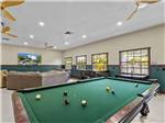 A pool table and TV viewing area - thumbnail