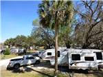 View larger image of One of the unpaved RV sites at SPORTSMANS COVE CAMPGROUND image #3