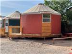 View larger image of A row of rental yurts at CRAZY HORSE RV RESORT image #2