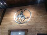View larger image of A metal bucking bronco sign at CRAZY HORSE RV RESORT image #4