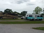 RVs parked in large sites at Camp Mi Casa on the Route RV Park - thumbnail
