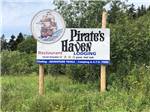 View larger image of Sign at the entrance at PIRATES HAVEN RV PARK  CHALETS image #10