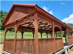A red wooden pavilion at 4 GUYS RV PARK - thumbnail