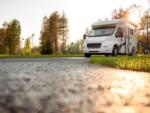 View of a motorhome from ground level at Bedford Creek Campground & Marina - thumbnail