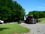 Parked RV at Byrd's Branch Campground & Country Store - thumbnail