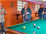 View larger image of A lady and two men pool at BLUEBONNET RV RESORT image #2