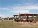 View larger image of A large gazebo with seating at BLUEBONNET RV RESORT image #4