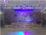 View larger image of The stage inside the recreation hall at BLUEBONNET RV RESORT image #8