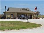 View larger image of The front entrance building at WHISTLE STOP RV RESORT image #1