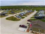 View larger image of Aerial view over campground at WHISTLE STOP RV RESORT image #2