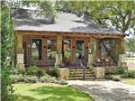 The office building situated under shade trees at Stonebridge RV Park & Resort - thumbnail