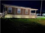 One of the cabin rentals lit up at DEEP CREEK RV RESORT & CAMPGROUND - thumbnail