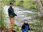 A father and son fishing at HAT CREEK RESORT & RV PARK - thumbnail