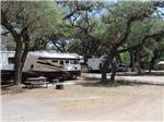 View larger image of A group of RV sites under the trees at RIVERBEND ON THE FRIO image #6