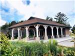 The pavilion with picnic tables at MANISTIQUE LAKESHORE CAMPGROUND - thumbnail
