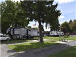 A row of paved back in RV sites at GOOSE CREEK RV PARK & CAMPGROUND - thumbnail