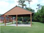 The pavilion with picnic tables at BAYOU BEND RV RESORT - thumbnail