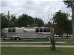 A bus conversion in an RV site at OAKDALE PARK - thumbnail
