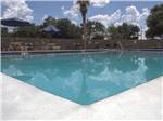 View larger image of The very large pool area at WILDWOOD RV VILLAGE image #6