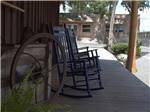 A couple of rocking chairs at WILDWOOD RV VILLAGE - thumbnail