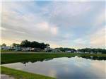 View larger image of View of water and RVs at sunset at WILDWOOD RV VILLAGE image #9
