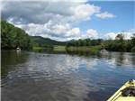 View on the river from inside a kayak at RIVERSIDE CAMPING & RV RESORT - thumbnail