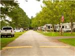 Street lined with trailers camping at campsite at THOUSAND TRAILS HARBOR VIEW - thumbnail