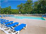 View larger image of Swimming pool with outdoor seating at OLD CHATHAM ROAD RV CAMPGROUND image #1