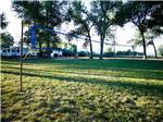 A volleyball net on the grass at ECHO ISLAND RV RESORT - thumbnail