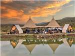 People under the tent enjoying music - thumbnail