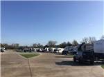 View larger image of A row of covered RV sites at VALLEY ROSE RV PARK image #2