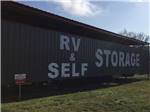 RV & Self Storage painted on the side of the building at VALLEY ROSE RV PARK - thumbnail