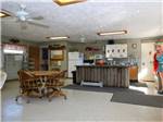 The front kitchen area with island at The Oaks at Zephyrhills - thumbnail