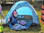 A dummy set up in a tent at GRANDMA'S GROVE RV PARK - thumbnail