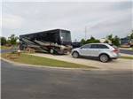View larger image of One of the paved pull thru RV sites at HIDDEN CREEK RV RESORT image #10