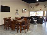 View larger image of Sofa and table inside the lounge at HIDDEN CREEK RV RESORT image #12