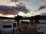 RV sites with lake in the distance at Bridgeport Reservoir Marine and Campground - thumbnail