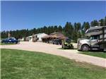 View larger image of A gravel road leading up to some buildings at CUSTER CROSSING CAMPGROUND image #1