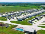 Aerial view of the park, pool and playground at TEXAS RANCH RV RESORT - thumbnail