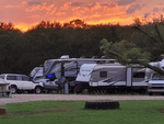 RVs in sites at sunset - thumbnail