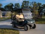 A golf cart parked next to the cabin rentals at LURAY RV RESORT & CAMPGROUND ON SHENANDOAH RIVER - thumbnail